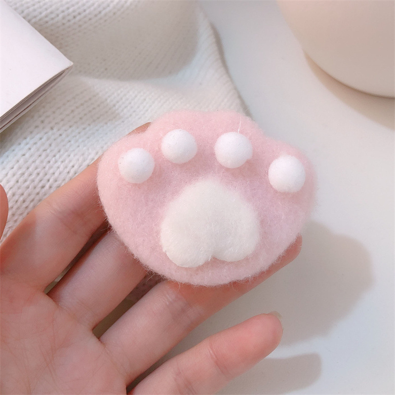 Заколка для волос "Плюшевая лапка" розовый