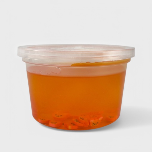 Слайм "Стекло" оранжевый, с дек наполнителем корги 180гр STORIZ