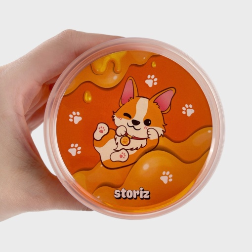 Слайм "Стекло" оранжевый, с дек наполнителем корги 180гр STORIZ