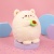 Мягкая игрушка "Котик с авокадо" бежевый, 20 см