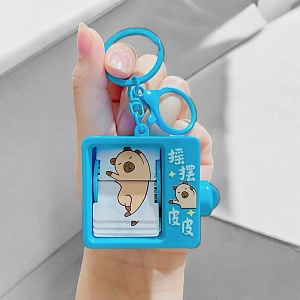 Брелок "Капибара танцует" голубой