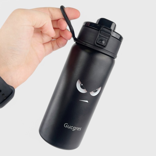 Термос-кружка "Gucgres" злой взгляд, черный, 550мл оптом