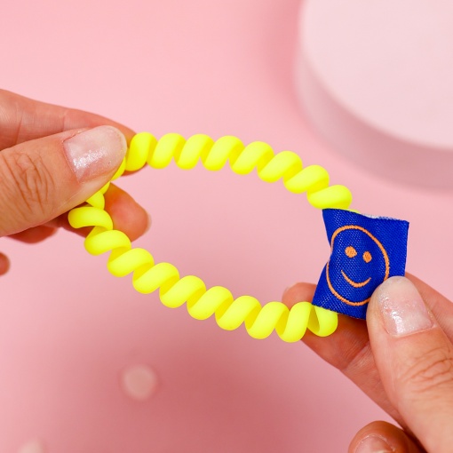 Резинка для волос "Пружинка Смайлик" желтый
