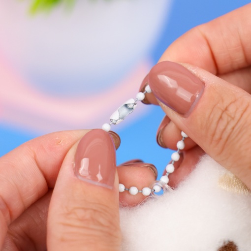 Мягкий брелок "Пищащий мишка" белый